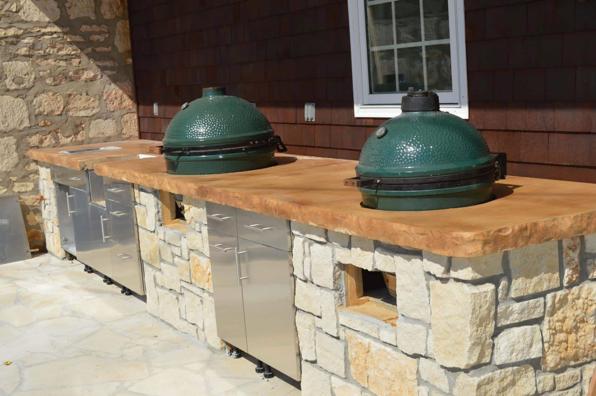 exterior concrete counter tops with two grills inserted